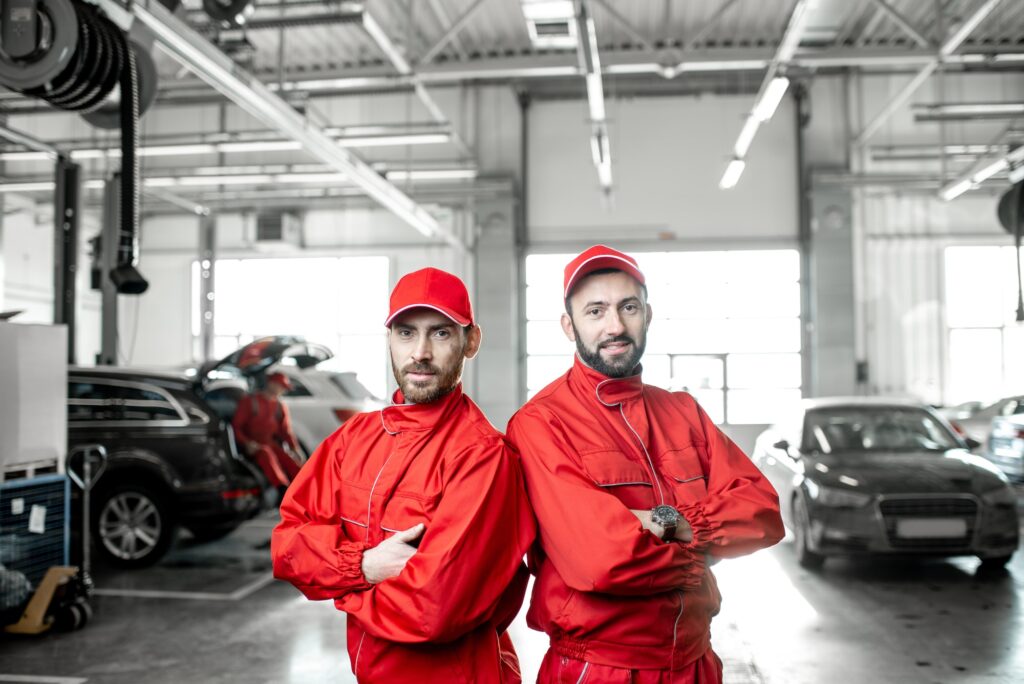 Portrait of an auto mechanics indoors