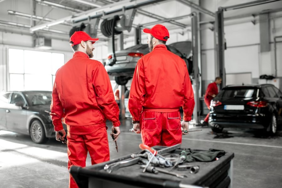 Portrait of an auto mechanics indoors